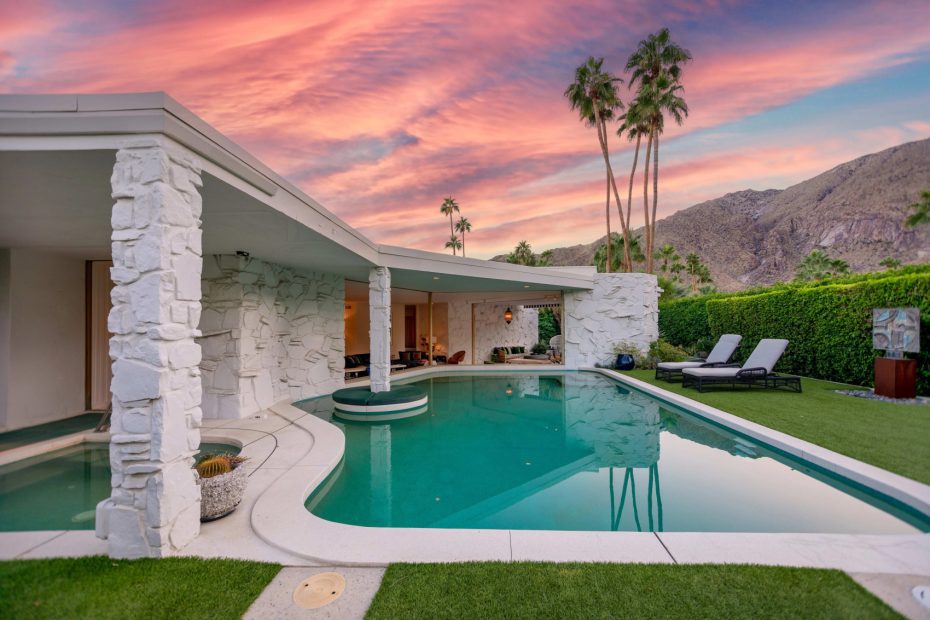 house pool with white painted stone minimal furnishings