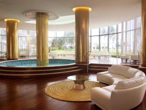 New gold leaf tile on columns and in refrecting pool